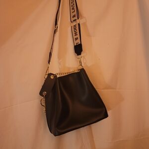 Chic Black Shoulder Bag with Gold Details